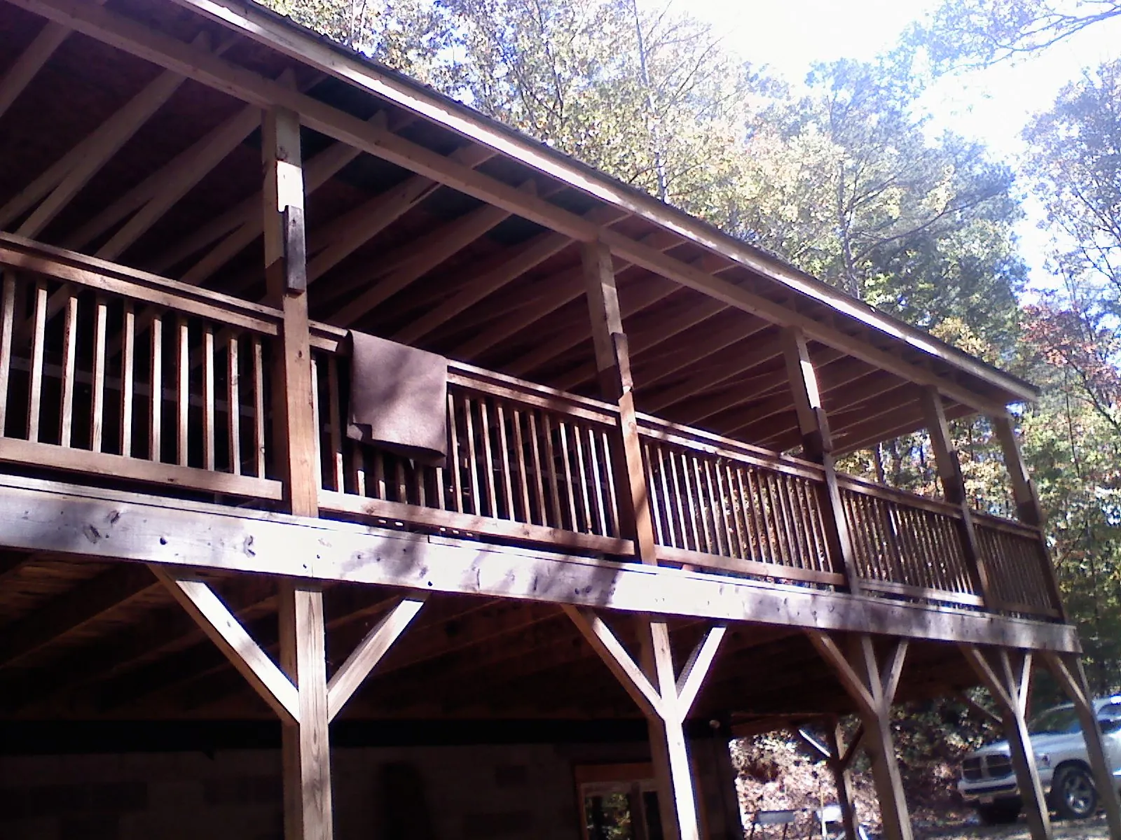 Timber framing under a new elevated porch and deck — Roof Leak Repair in Santa Monica by Roofing Brothers